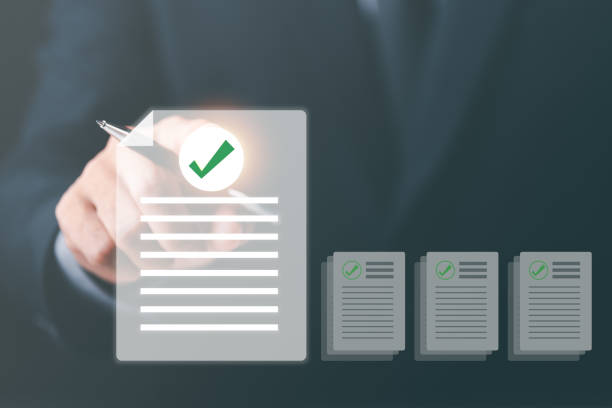 Businessmen review procedures through documents containing checkbox lists, rules of conduct concepts, rules and policies, company regulatory documents, terms and conditions.