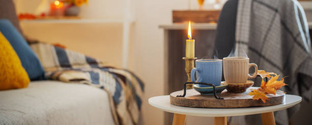 istock two  cups with hot drinks at home with autumnal decor 1432396268