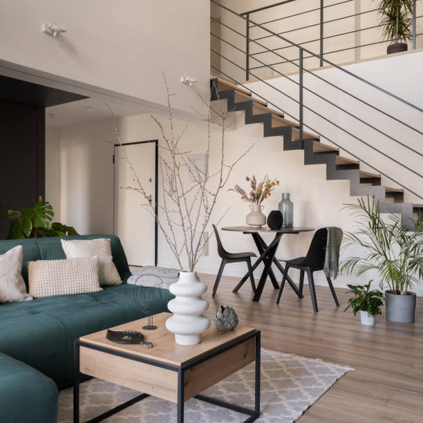 istock Dining table under stairs in open living room 1432403641