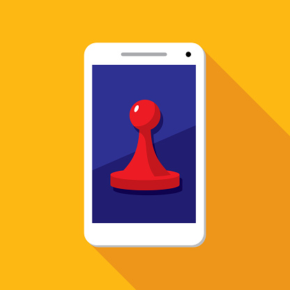 Vector illustration of a smartphone with board game piece icon against a yellow background in flat style.