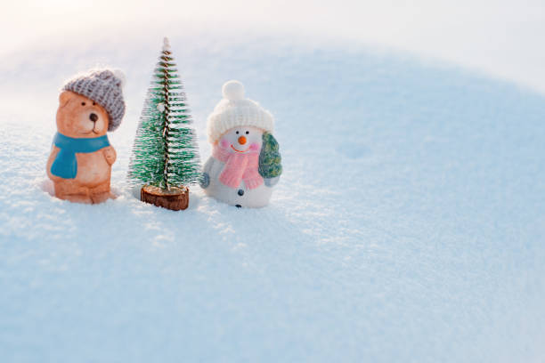 istock Christmas fun decorative figurines on a snowy background. Christmas card. 1432409944