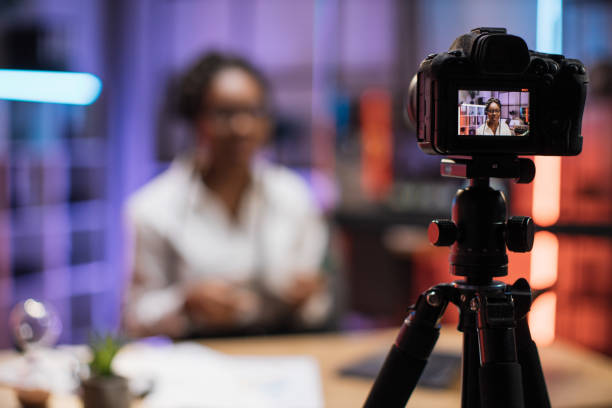 istock Focus on camera screen with attractive confident experienced smart female african american 1432410804