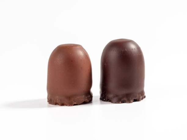 istock Marshmallow treats in chocolate on a white background. 1432410990