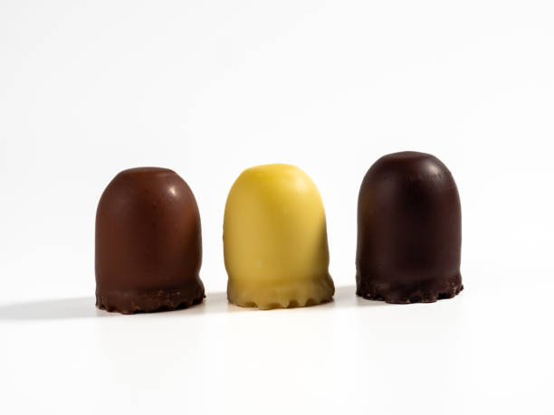 istock Marshmallow treats in chocolate on a white background. 1432410993