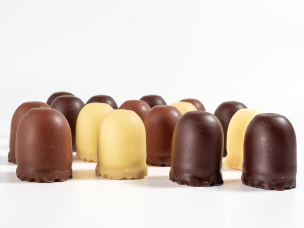 istock Marshmallow treats in chocolate on a white background. 1432410995
