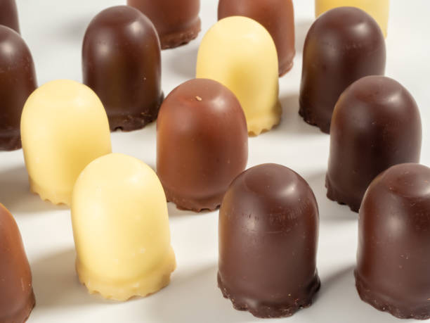 istock Marshmallow treats in chocolate on a white background. 1432411007