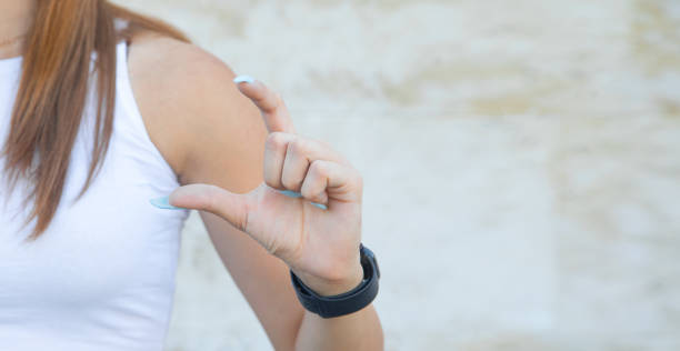 istock Girl doing small size sign with fingers. 1432411403