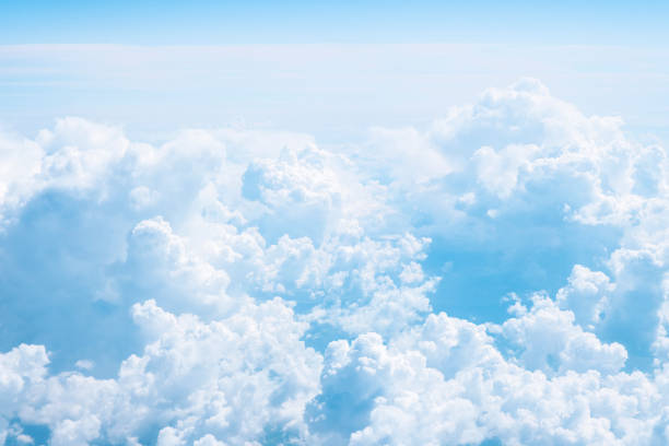 istock Beautiful soft blue cumulus clouds. Background with copy space. 1432413265