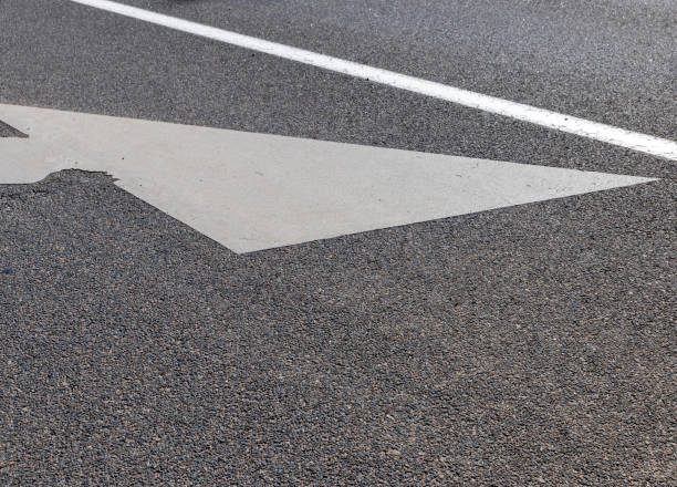 istock Paved highway with white road markings 1432413988