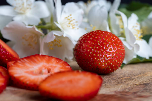 istock Ripe red strawberries lying on a wooden tray 1432414632