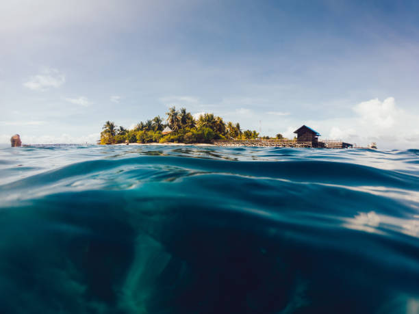 istock Green island in tropical seascape 1432418082