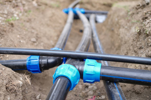 istock Connecting water supply plastic pipes on ground 1432419791
