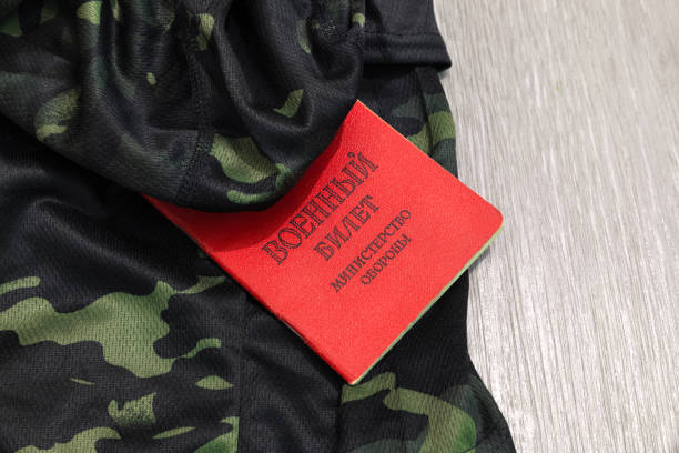 Military ID on army clothes. Mobilization in the Russian
