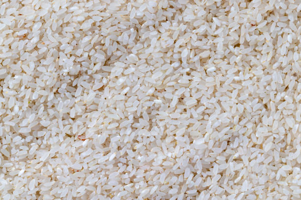 istock a pile of scattered white rice on the kitchen table 1432420501