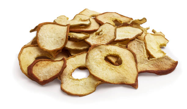 istock Pear dried fruits heap close up isolated on white 1432420697