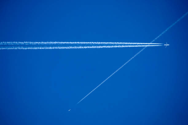 istock The trails in the sky that leave the planes in flight 1432420735