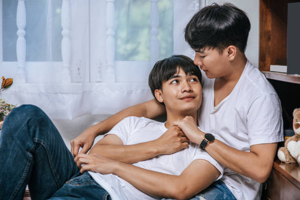 istock Two beloved young men slept in bed together. 1432421331