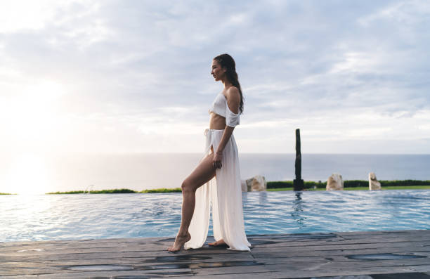 istock Slim woman standing on wooden path 1432422352