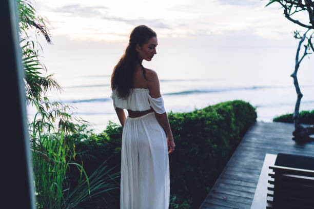 istock Young woman chilling on terrace while having tour 1432422386