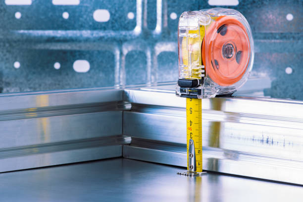 istock Measuring tape with metal profiles close-up, tool and component 1432427769