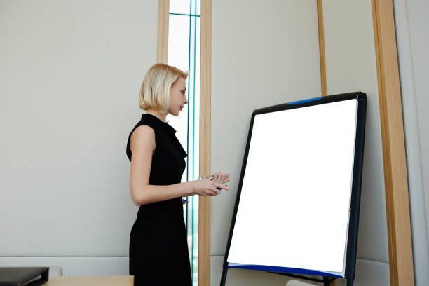 istock Female director telling about details of project 1432428612