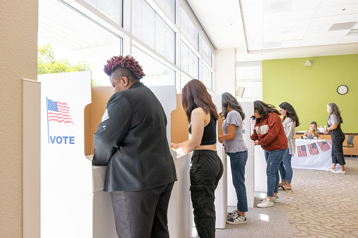 Women voting at a local community center.