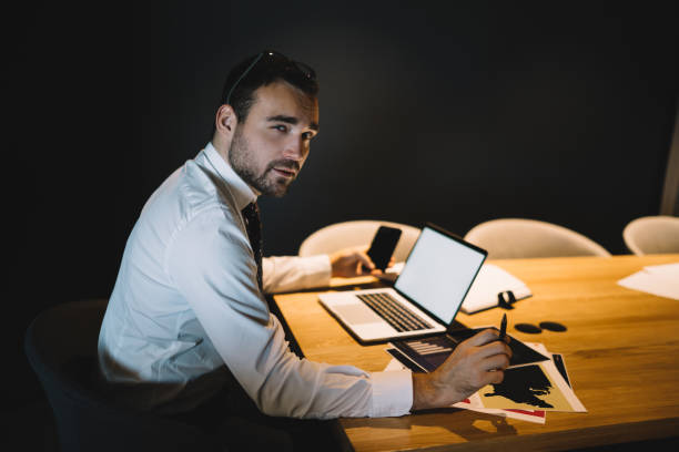 istock Classy businessman working with laptop in office 1432433885