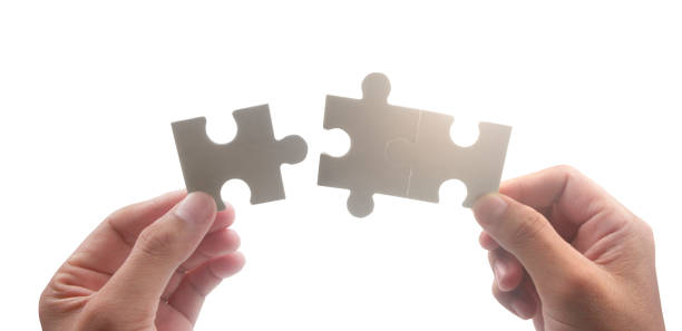 istock Connecting jigsaw puzzle. Business solutions success 1432435465