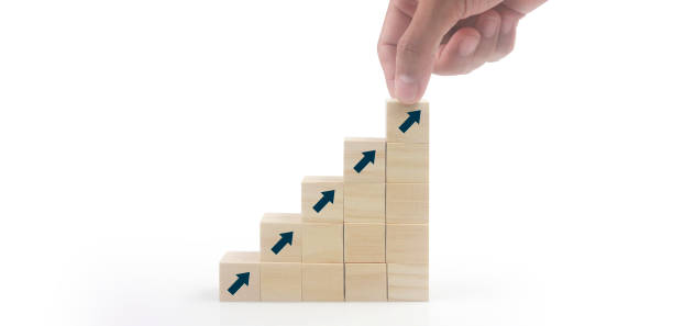 istock Business connecting piece of multi wood chart blocks steps in hand 1432435482