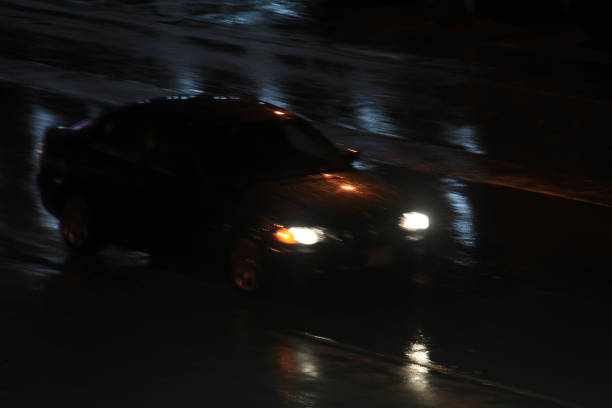 istock Speeding Car in the Night 1432436315