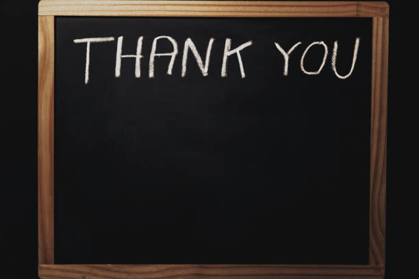 istock word thank you written on a black chalkboard 1432437609