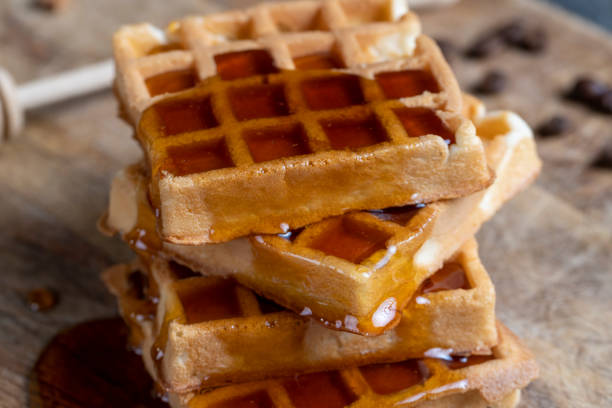 istock soft waffles with natural bee honey on a serving board 1432438131