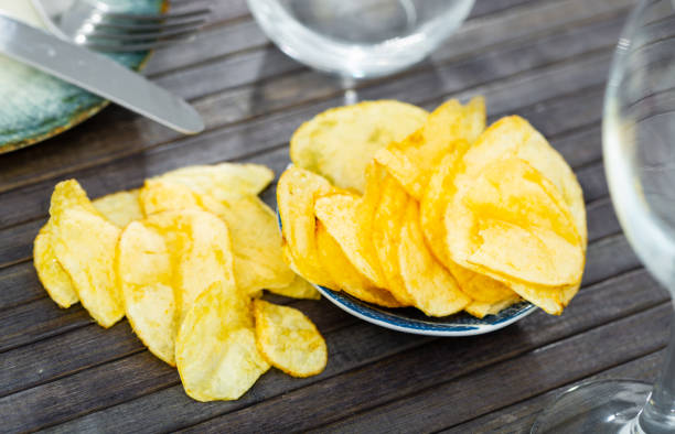 istock Round plate of potato chips viewed from above 1432442621