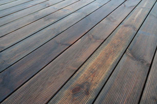 istock Background with brown wet wood decking 1432444573
