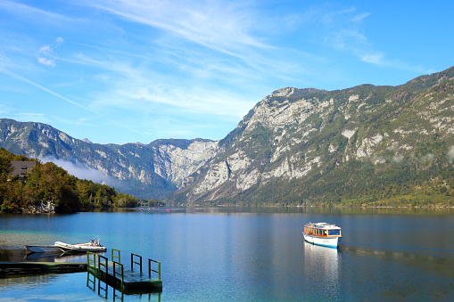 Slovenia, September 24, 2019: Beautiful autumn at Bohinj Lake in Triglav National Park, Slovenia, Europe