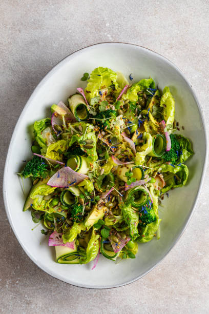 istock roasted brussels sprouts with grapes, Green Vegetables with grapes,nuts and balsamic vinegar 1432447905