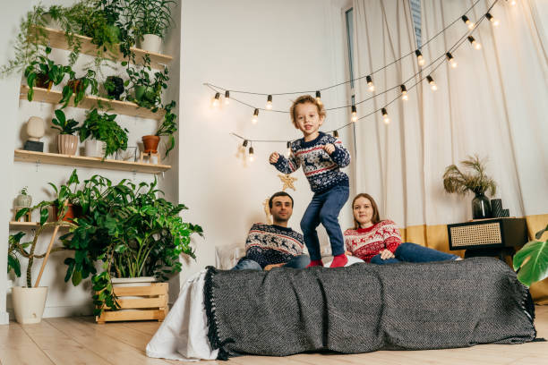 istock Happy family have fun on bed. Home. 1432448112