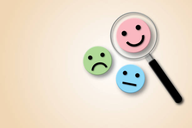 istock Magnifier focuses on smile face circle and pastel background. Concept of positive thinking. 1432448273
