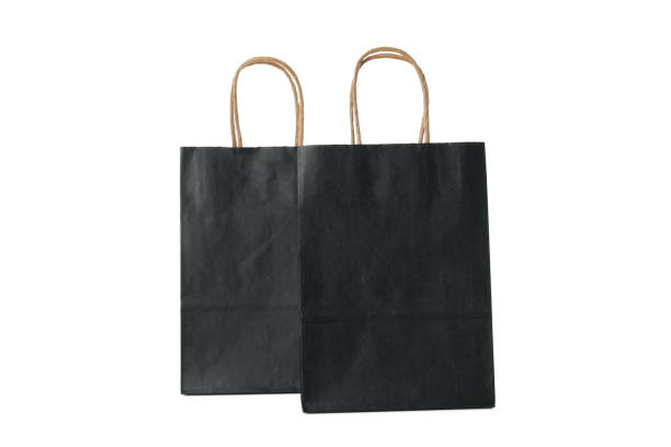 istock Black paper bags isolated on white background 1432456985