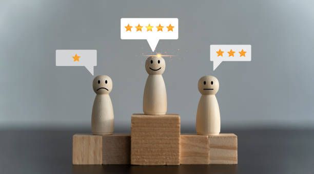 istock Concept image of setting a five star goal. increase rating or ranking, evaluation and classification idea. Customer Experience dissatisfied emotion face on wooden block 1432460264