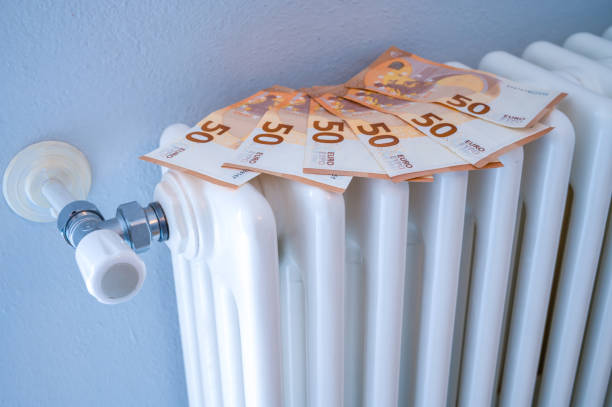 istock Radiator and money. Heating costs. 1432460413