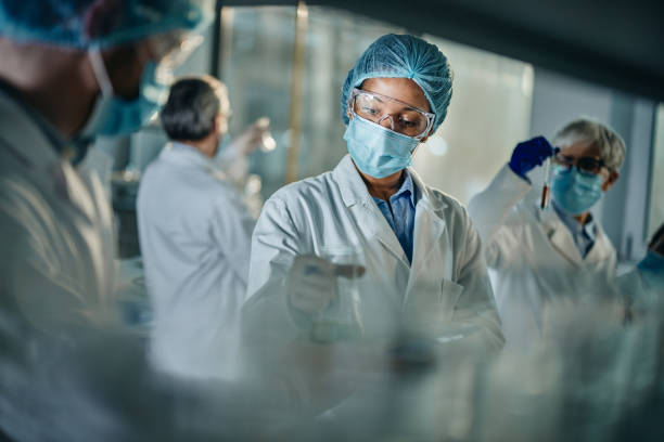 istock Young chemists working on poisonous chemicals in laboratory. 1432462479
