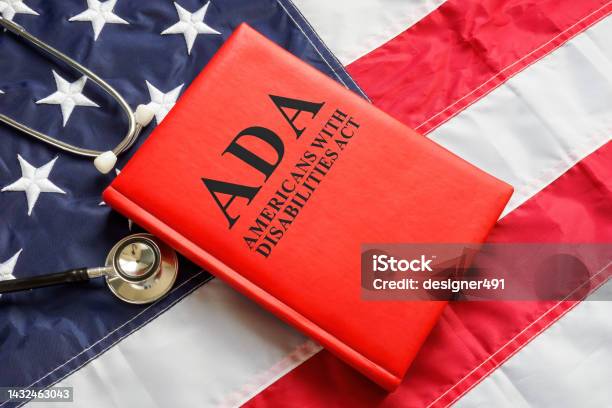 American Flag Book The Americans With Disabilities Act Ada Law And Stethoscope Stock Photo - Download Image Now