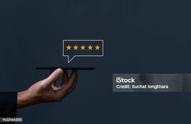 Positive Customer Reviews Write A Fivestar Review Satisfaction Feedback And Customer Service Concepts Best Response From The Product User Experience Dark Background Stock Photo - Download Image Now