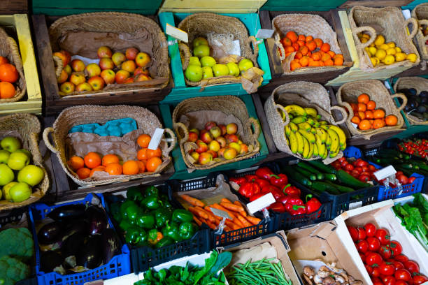 istock Market counter with fruits and vegetables 1432464998