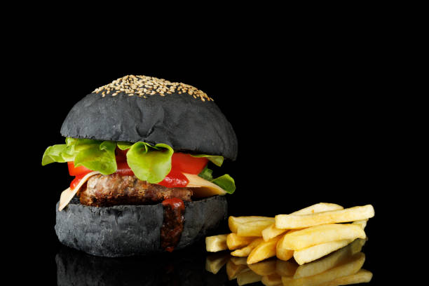 istock Black burger and french fries 1432465245