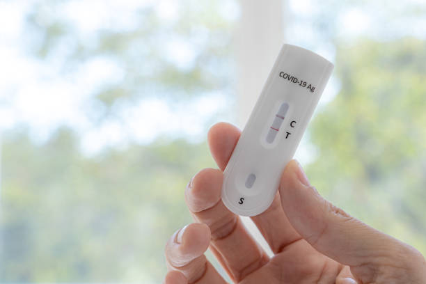 istock Coronavirus antigen test with positive result. 1432466004