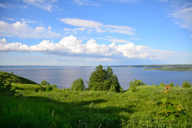 istock top of the hill with cloudscape and blue water on background 1432466476
