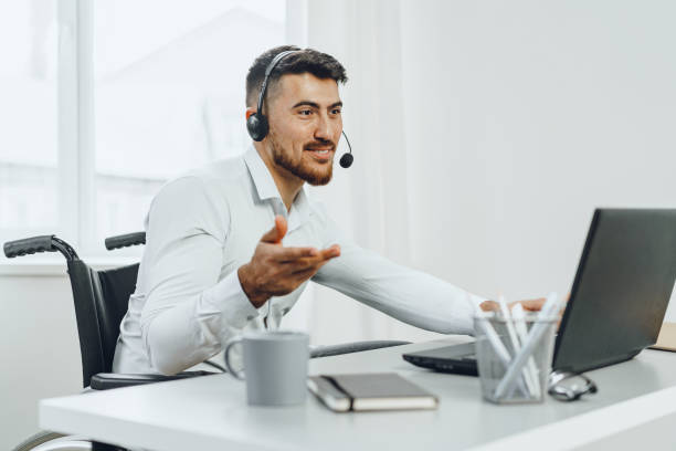 istock Disabled young man businessman working from home 1432470468