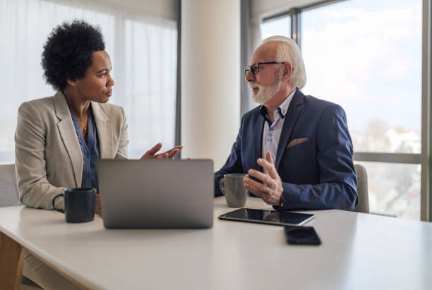 istock Two diverse business partners, having a strategy meeting. 1432470567